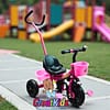 white (1) Kids Tricycle with Parent Push Handle, Backrest & Basket – Pink