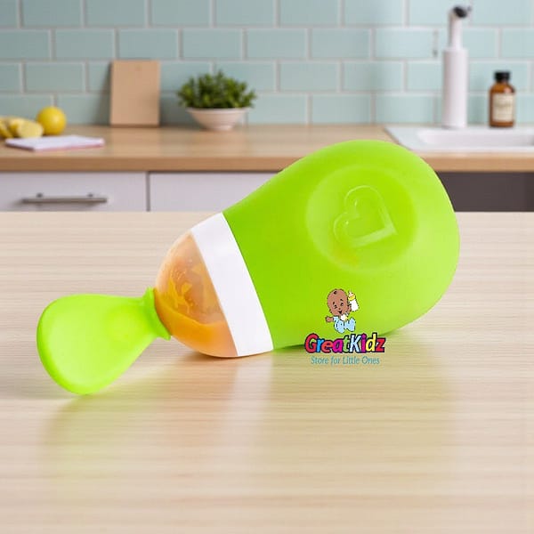 Munchkin_Squeeze_Spoon_Multicolo (1) Baby Squeeze Spoon Feeder for Infants – Soft Silicone Feeding Spoon